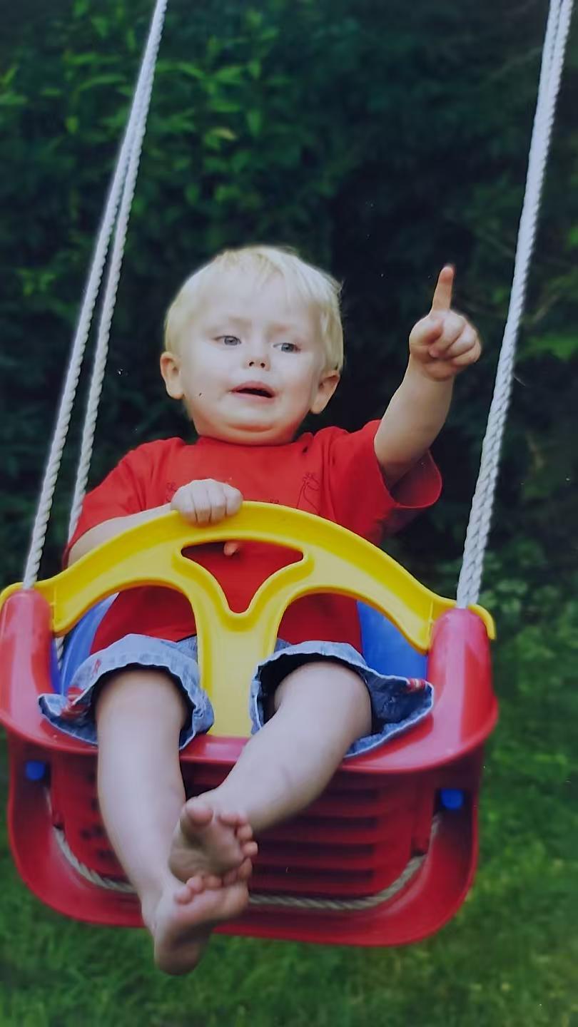 Lenni on a swing